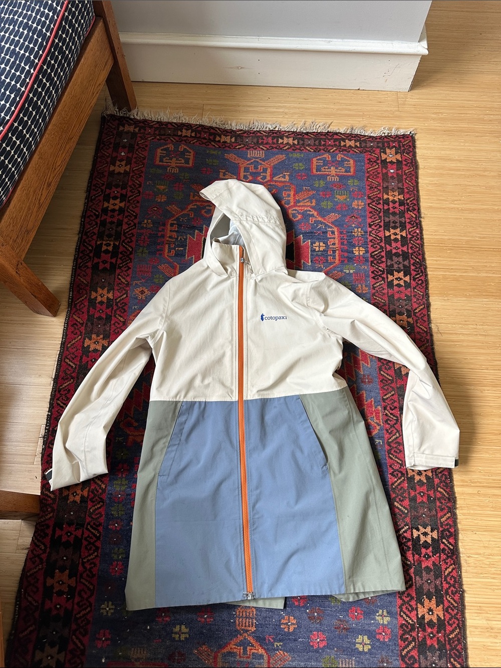 Cotopaxi cream, blue & gray hooded rain jacket